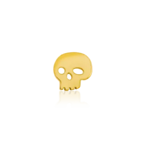 A close up photo of the Junipurr Jewelry Gold Skull