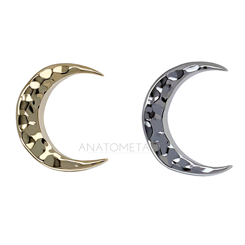 A close up photo of the Anatometal 18k Moon